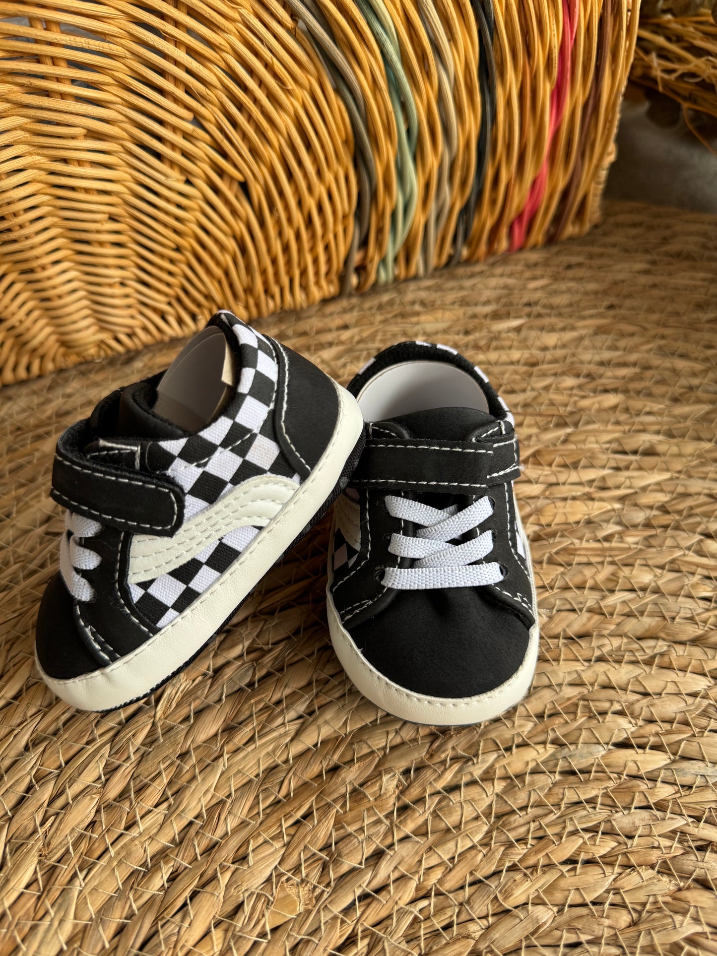 Black and white Vans with square